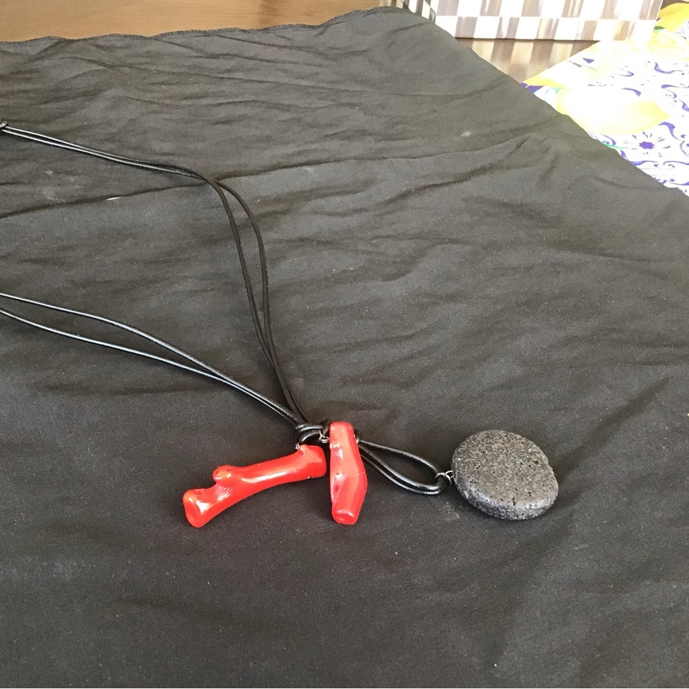 Red coral and volcanic black stone crafted by hand in Greece. Never worn